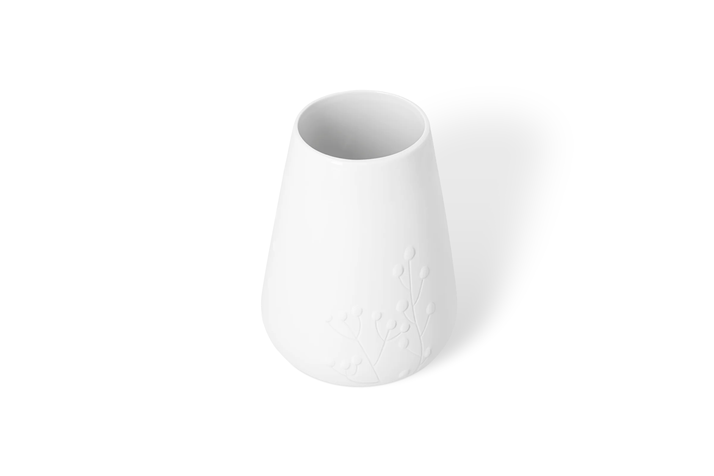 Weiße Porzellanvase Blütezeit mit erhabenem Blumenrelief in der Rückansicht in Neigung.