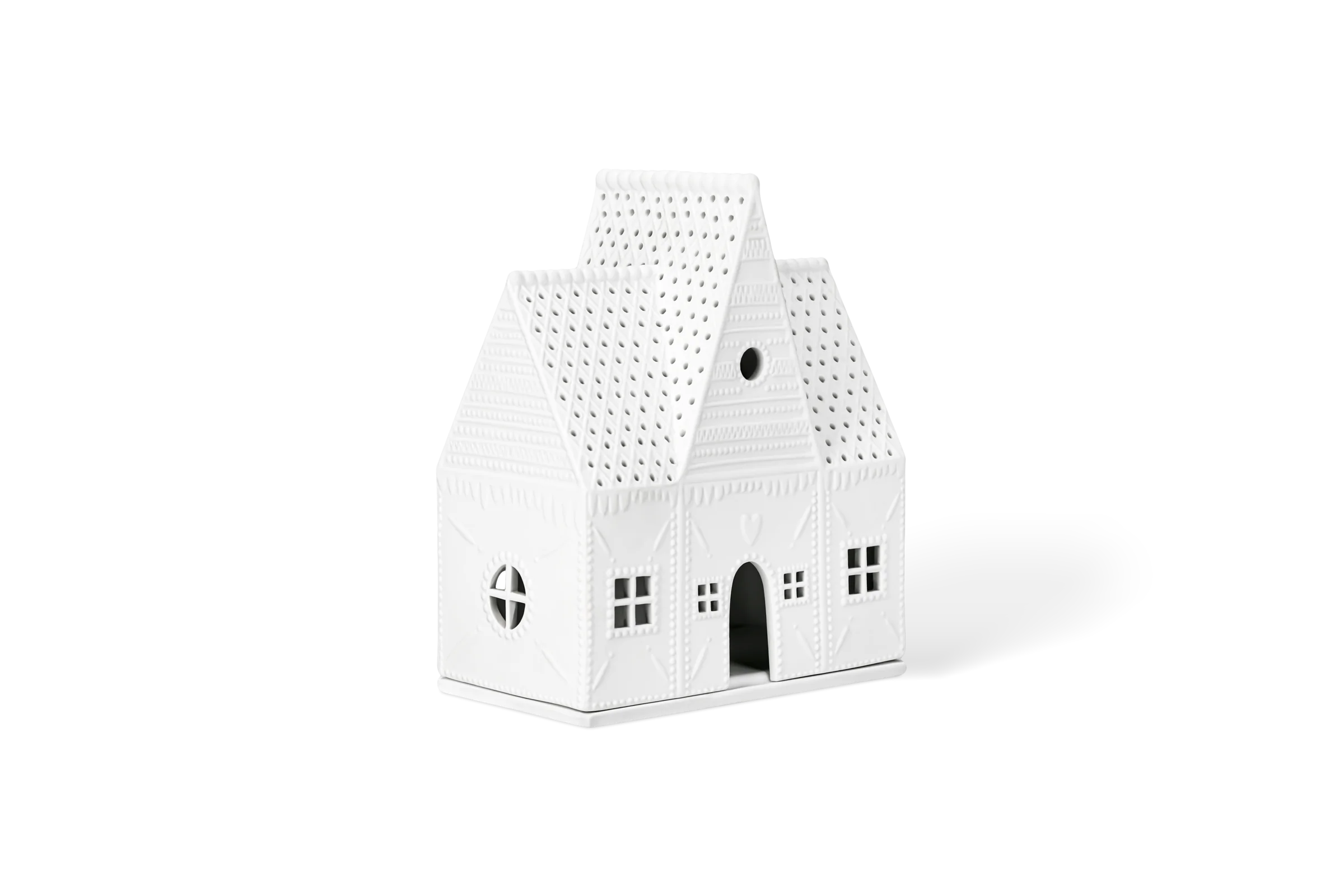 Lichthaus Lebkuchen Groß Weißes Porzellanlichthaus mit perforiertem Dach, eingeprägten Mustern, Fenstern und Tür in der vorderen Linksansicht.