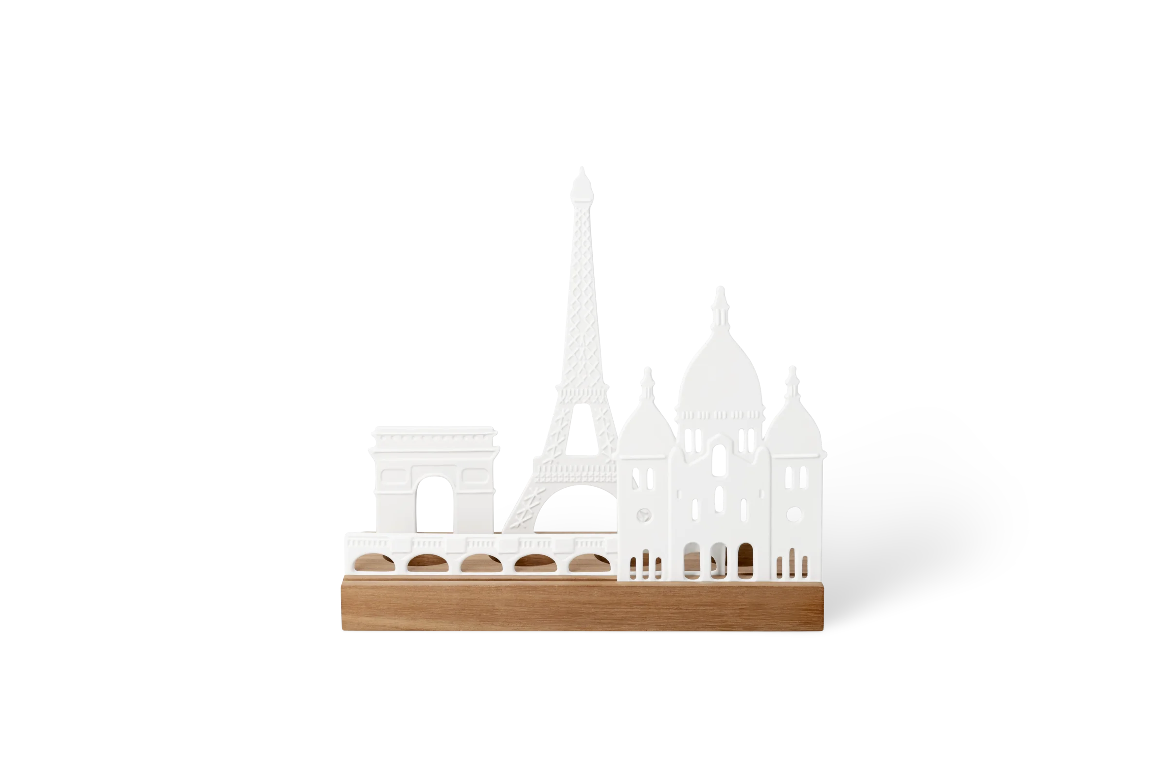 Weiße Lichtszene mit Pariser Stadtsilhouette aus Eiffelturm, Triumphbogen und Sacré-Cœur auf Holzsockel, in der Vorderansicht.