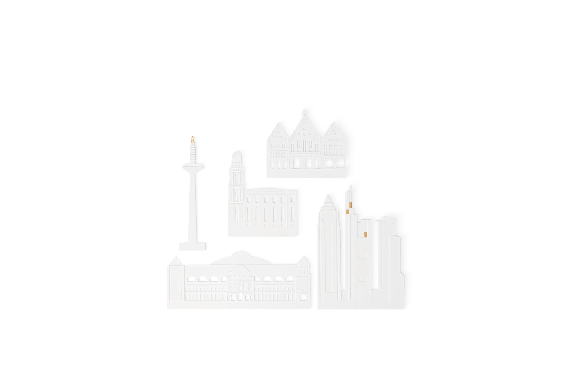 Weiße Einzelteile der Frankfurter Stadtsilhouette mit Türmen und Gebäuden in der Teileansicht.