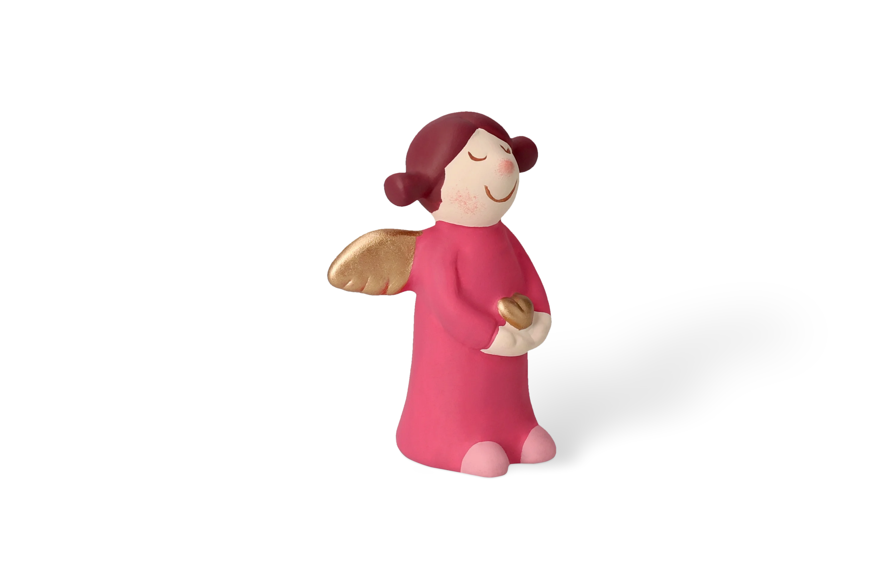 Vordere Linksansicht Dekofigur Himmlische Schwester mit goldenen Fluegeln im pinken Kleid haelt kleines goldenes Herz