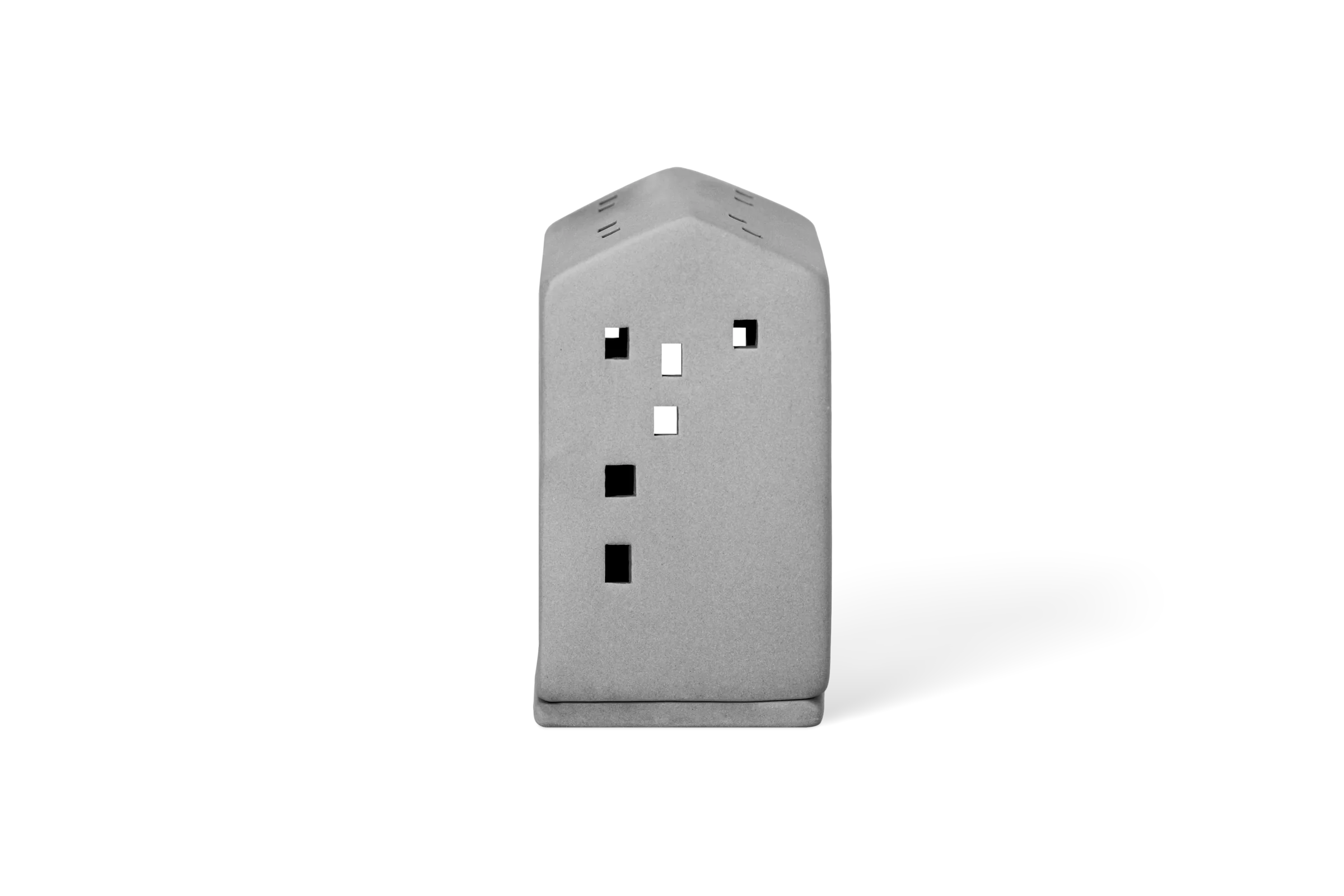 Graues Lichthaus der Serie Softtone mit kleinen quadratischen Fenstern und seitlichen Lüftungsschlitzen in der Rückansicht.