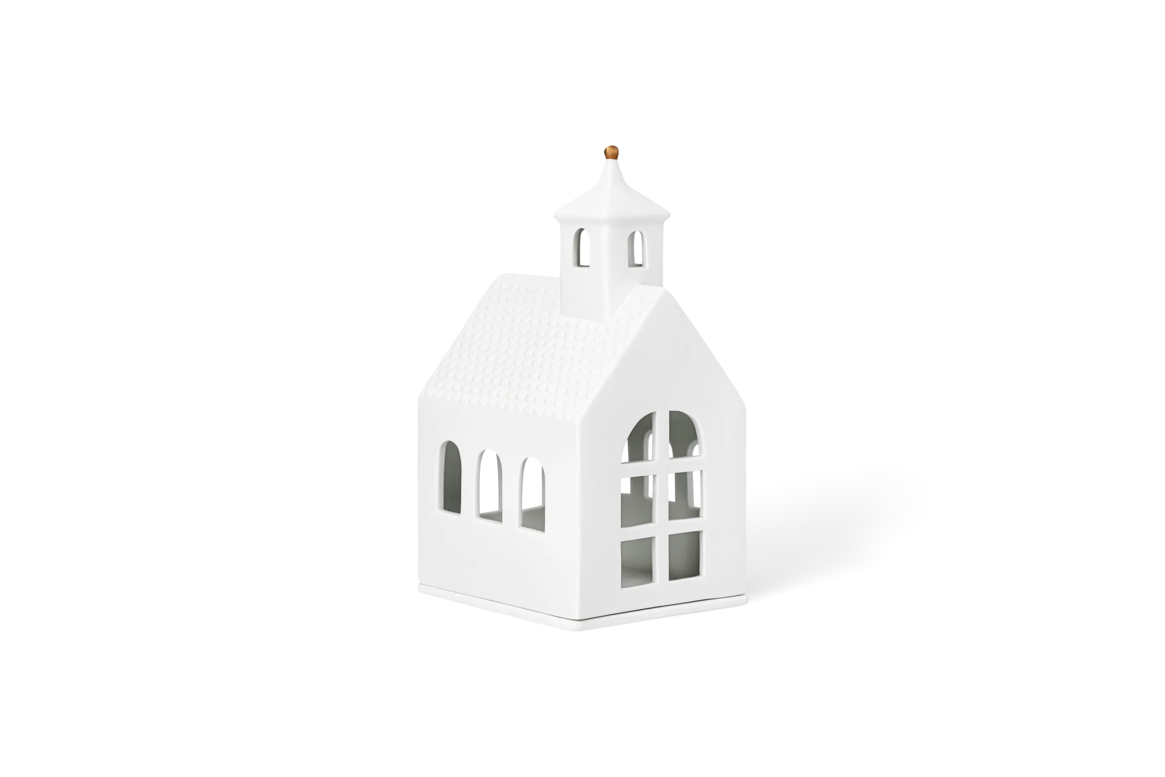 Lichthaus Kapelle Groß Weißes Lichthaus in Form einer Kirche mit strukturiertem Dach, Turm und Fensterausschnitten in der vorderen Linksansicht.