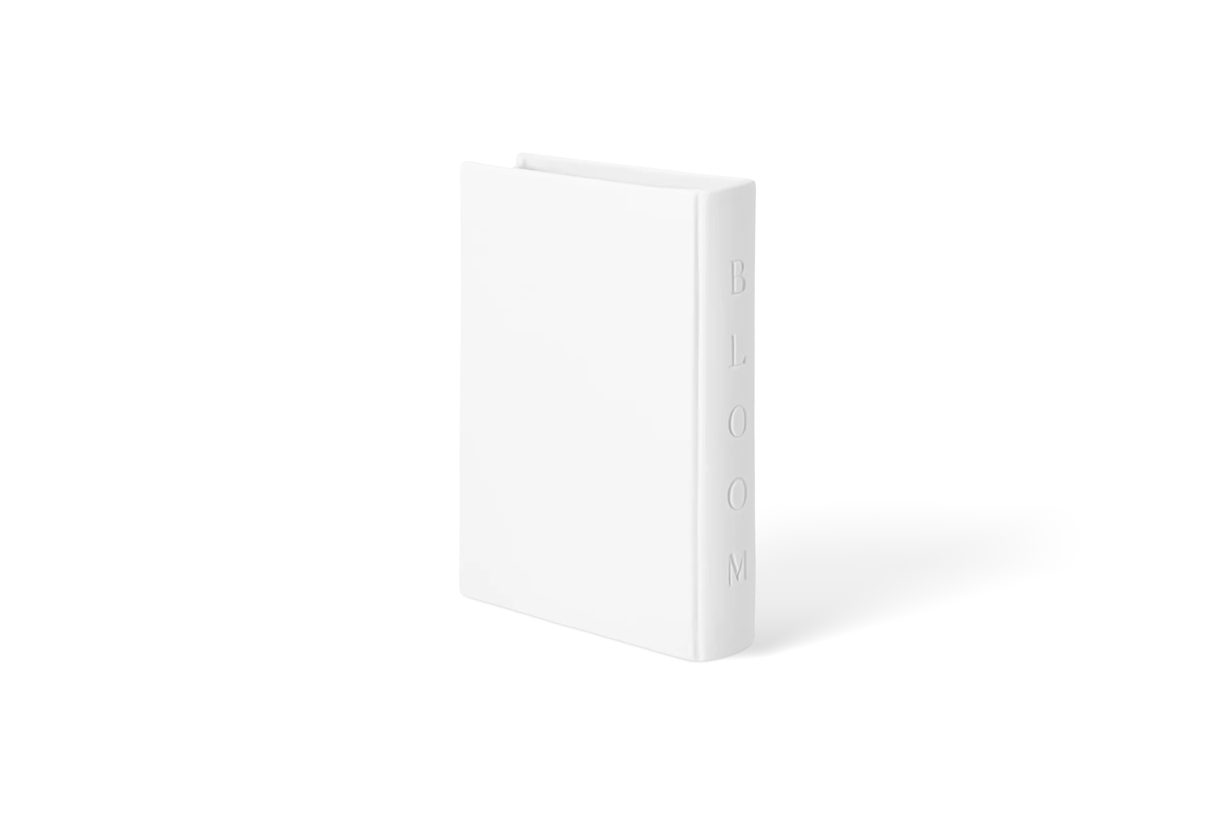 Weiße Vase in Buchform mit eingeprägtem Schriftzug BLOOM am Buchrücken in der hinteren Rechtsansicht.