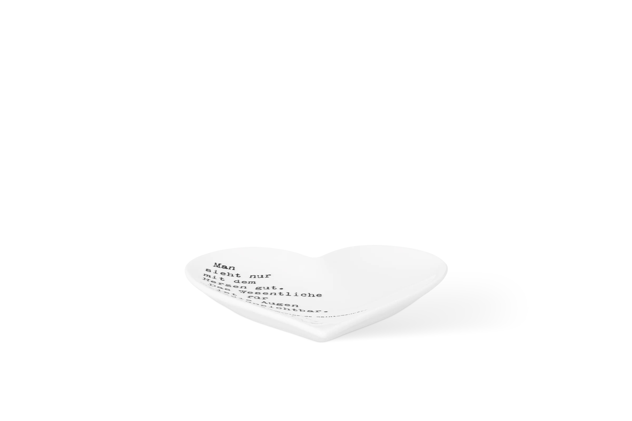 Herzteller Klein Man sieht nur Weiße herzförmige Schale mit schwarzem Schriftzug Man sieht nur mit dem Herzen gut in der Vorderansicht.