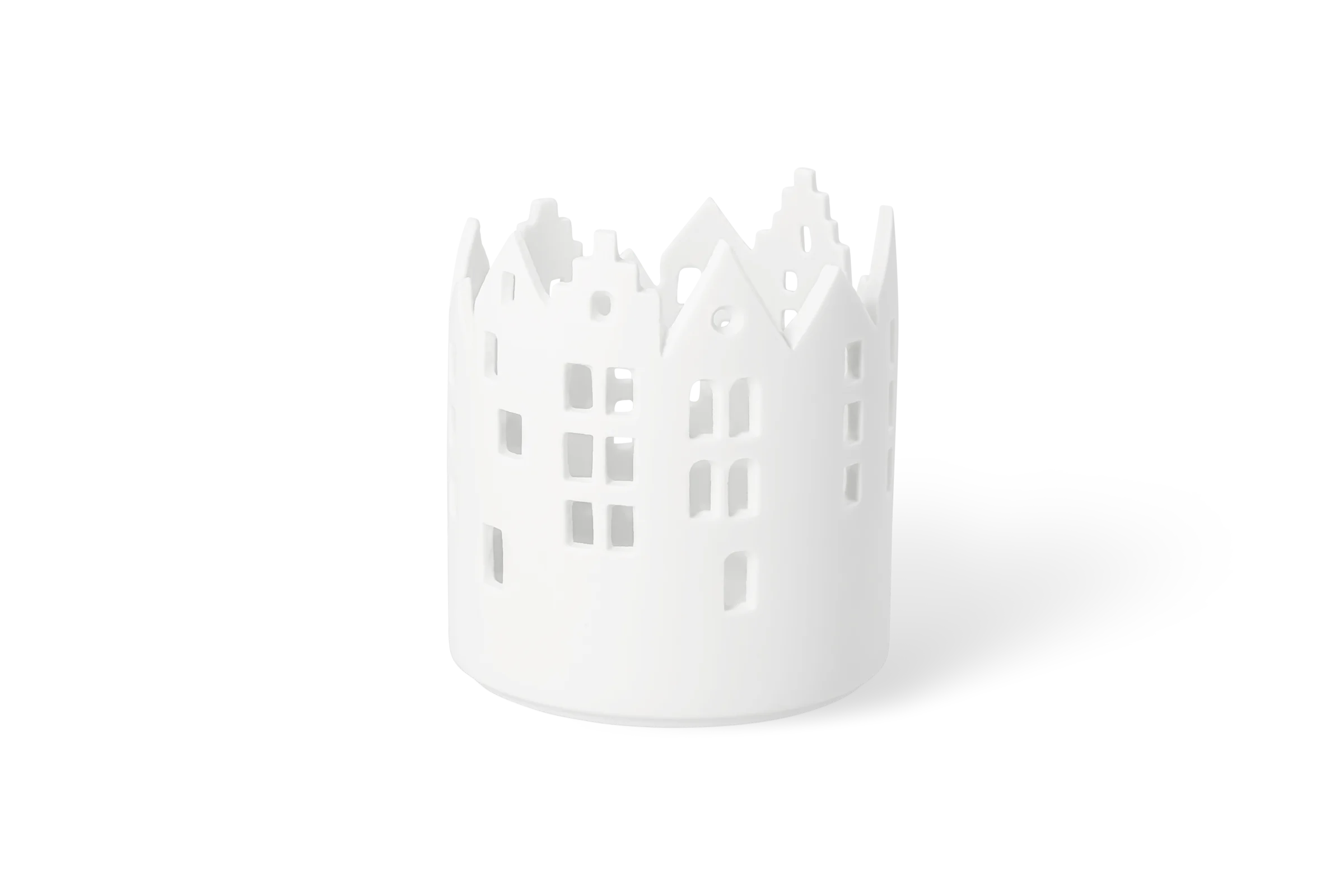 Teelichthalter Stadt Innenhof Weißer Teelichthalter Stadtlichter mit ausgestanzten Häusern, Fenstern und Dächern in der Vorderansicht.