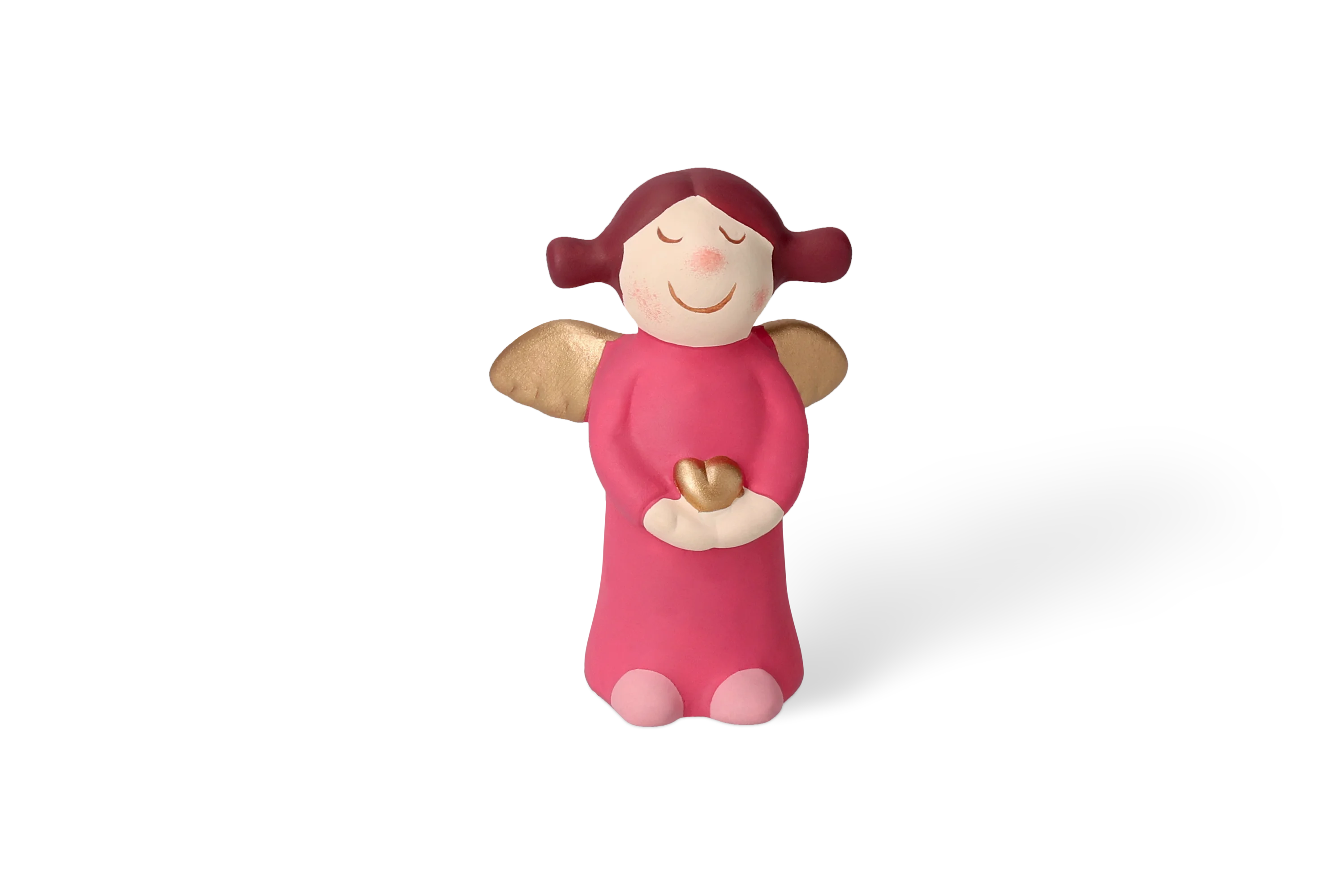 Dekofigur Himmlische Schwester mit goldenen Fluegeln im pinken Kleid haelt kleines goldenes Herz